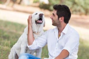 man with senior dog
